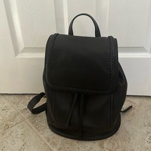 Like new Cole Haan backpack. Clean, lots of pockets and zipper compartments.
